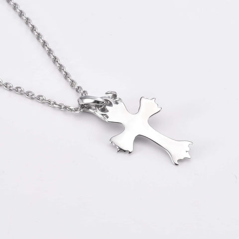 dark funeral cross pendant with a hand charm and white background